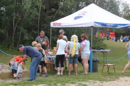 Food tent and treasure buried in sand